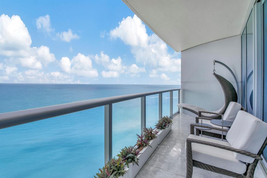 If you are a discerning buyer that has been searching for a turnkey ocean front condo in Sunny Isles in a premier building with AMAZING finishes that are the epitome of elegance and class, then you have found home. This spacious turnkey condominium has been completely remodeled from top to bottom featuring European white high gloss cabinetry and solid surface countertops, built in appliances including cooktop, subzero refrigerator, microwave, dishwasher, Sous Vide and Meili coffee maker. Marble floors, freshly painted walls and designer furnishing from Artifact complete your home.  Tech galore with one touch lighting, high end electronics, Looking for ample sleeping space? This home features built in murphy beds throughout featuring 3 queens, 4 twins and a king in the master.