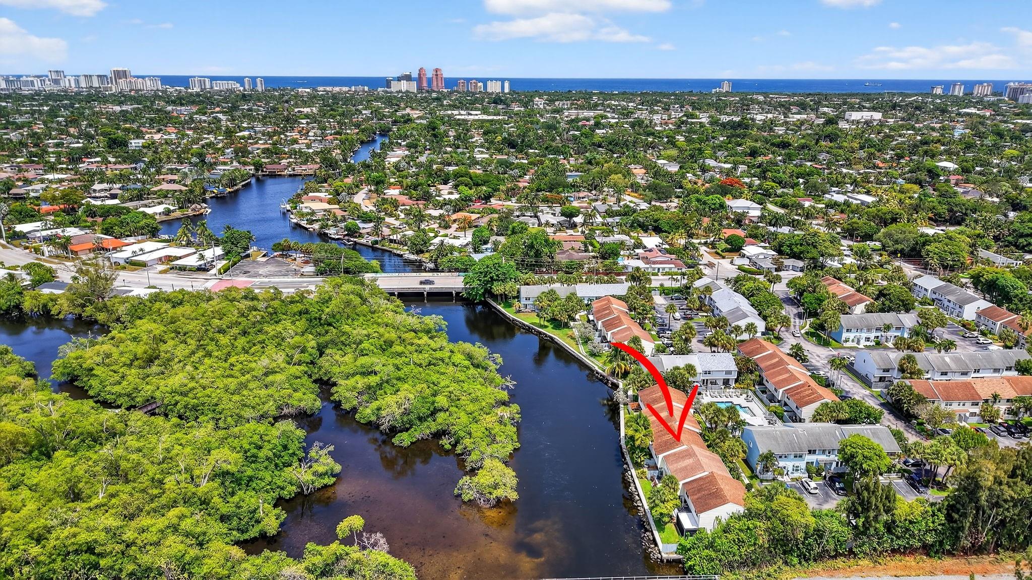 Welcome to Edgewater Townhomes, a beautiful gated community located directly on the South Fork Middle River. Just minutes from Downtown, pristine beaches, shopping, and delicious restaurants. This furnished 2 bed, 1.5 bath townhome has been meticulously maintained, offering a nice bright open living space, stainless steel appliances, impact windows/doors, and more! Wake up to serene views of the Middle River and enjoy a nice drink on your private deck, overlooking Colohatchee Park. Kayak to your hearts content and relax by the pool just steps from your front door. Washer/Dryer on 2nd floor. Water included.