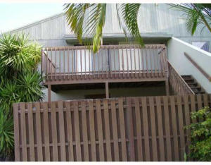 2 master size suites, each with large closet and private bath. Newer laminate flooring in living and ding area, newer carpet in bedrooms and freshly painted. Large fenced patio. Association allows 2 cats or 1 dog up to 40 lbs. Centrally located, minutes to I95, schools and shopping. Community has pool and clubhouse.