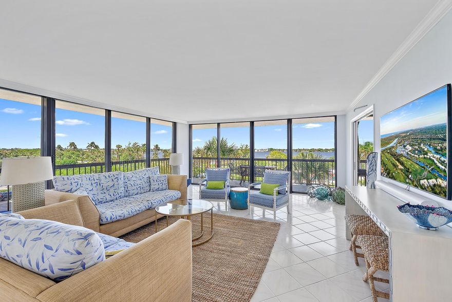 This sun-drenched 3-bedroom, 3-bath condominium offers breathtaking, unobstructed views of the Intracoastal Waterway, plus ocean peeks to enjoy spectacular sunrises. With over 2,100 SF of living space, the residence features a wrap-around balcony ideal for dinning al-fresco and soaking in mesmerizing sunsets. Inside, you'll find an open-concept layout with: a recently renovated eat-in kitchen and updated bathrooms, hurricane-impact windows and doors throughout, gleaming finishes and stylish details, a flexible third bedroom, perfect as a den or office, that opens to the living area for enhanced flow. The Emeraud, a boutique oceanfront building with only 27 residences, delivers resort-style living with: front desk staff, ample community room with catering kitchen, fitness center, heated