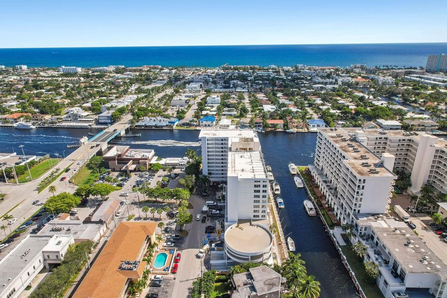 DIRECT intracoastal 2 bedroom and 2 full bathroom NE corner. Light and bright with recently updated kitchen and floors. Have a seat at the corner table that overlooks mega yachts passing under the Commercial Blvd bridge into LAUDERDALE BY THE SEA and have morning coffee what watching the sun rise from the ocean views in the horizon. Hurricane impact windows provide excellent sound suppression when closed and open up to allow amazing air flow throughout the entire living space. Walk immediately next door for dinner or drinks at Kaluz, or stroll right over the bridge for public beach access. The unit comes with garage parking and common area amenities include a direct intracoastal heated swimming pool and bbq grill. Fiber optic internet & tv, water, sewage and trash removal included in rent.