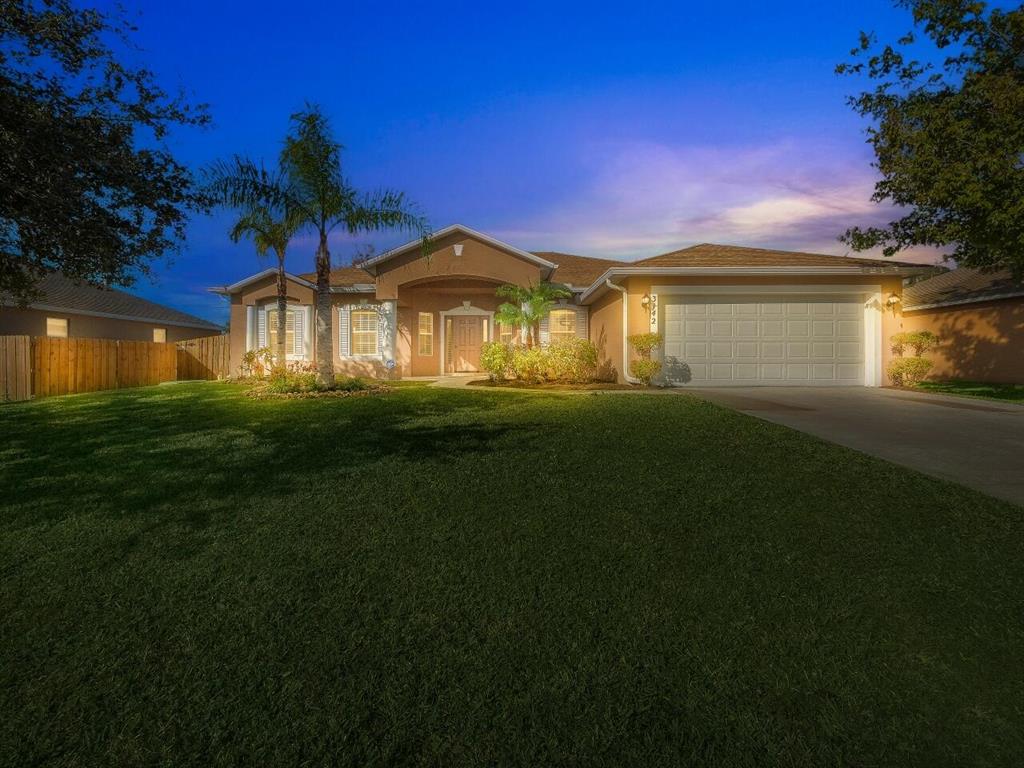 Photo of 3142 SW Cathedral Street, Port Saint Lucie, FL 34953 (MLS # R10760890)