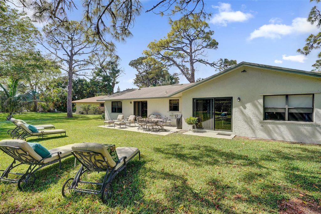 Photo of 715 NW 23rd Lane, Delray Beach, FL 33445 (MLS # F10556003)