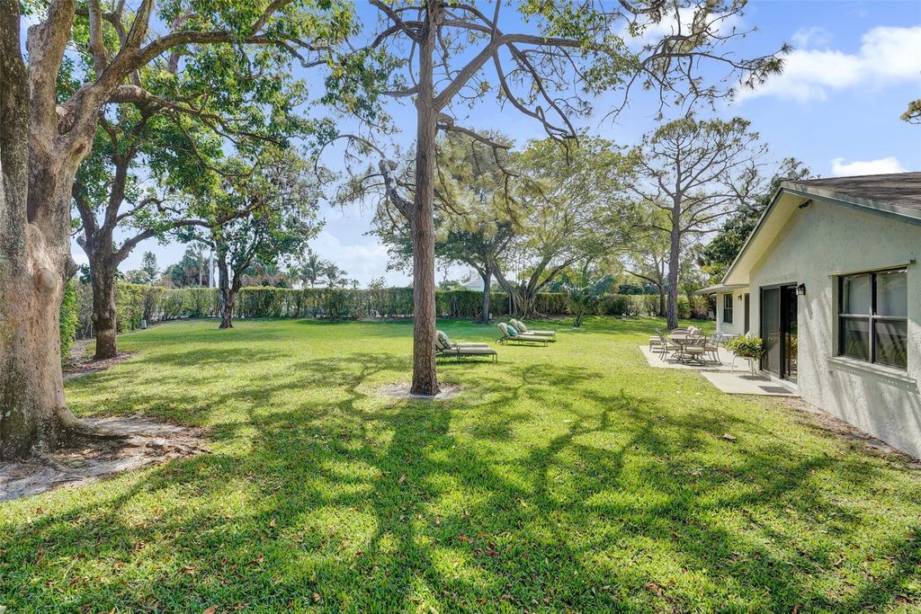 Photo of 715 NW 23rd Lane, Delray Beach, FL 33445 (MLS # F10556003)