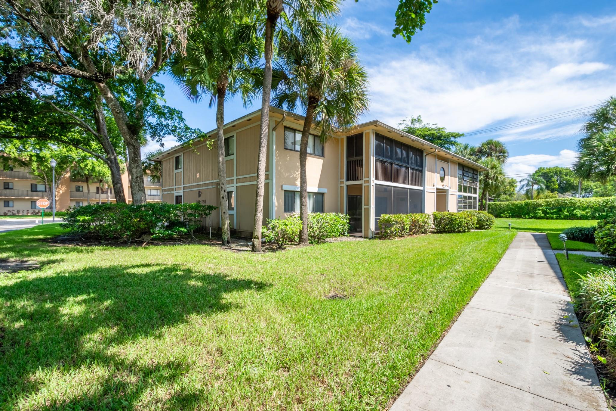 Motivated Seller! Move-in ready 2BD/2BA condo in the gated Ashmont section of the 55+ Kings Point community in Tamarac. Bright and spacious unit features tile & laminate flooring, walk-in closet, in-unit laundry, and a large patio with extra storage. Prime first-floor location just steps from the pool, with convenient parking and plenty of guest spaces nearby. Monthly fees include water, cable, Wi-Fi, and access to resort-style amenities: indoor/outdoor pools, spas, fitness center, clubhouse, theater, social clubs, and community shuttle. Furniture negotiable—act fast before it's gone!