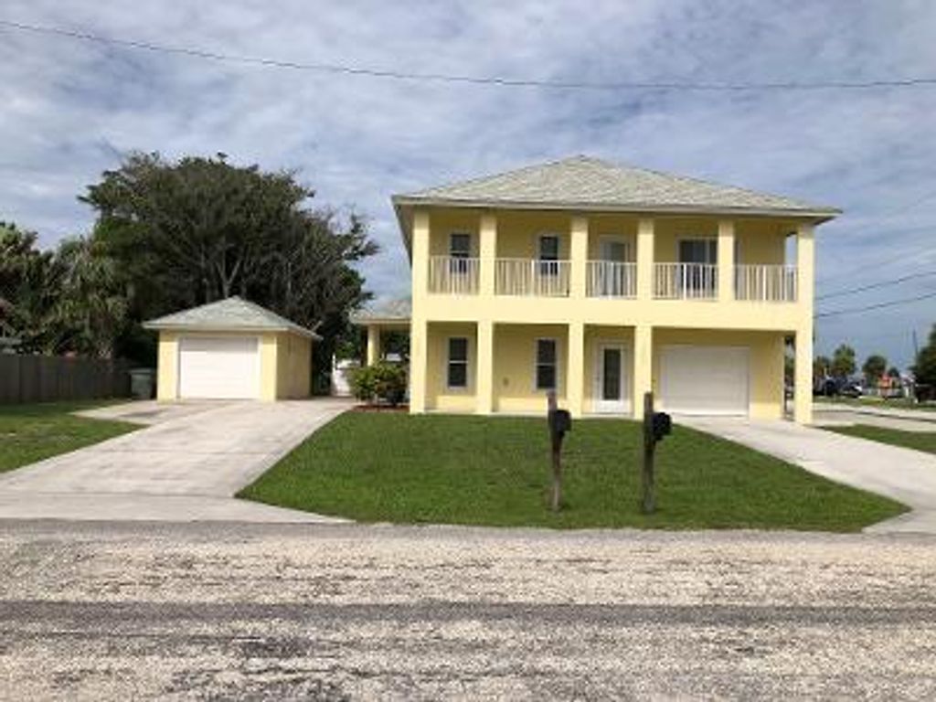 Photo of 1701 Pelican Drive, Fort Pierce, FL 34949 (MLS # R10738622)