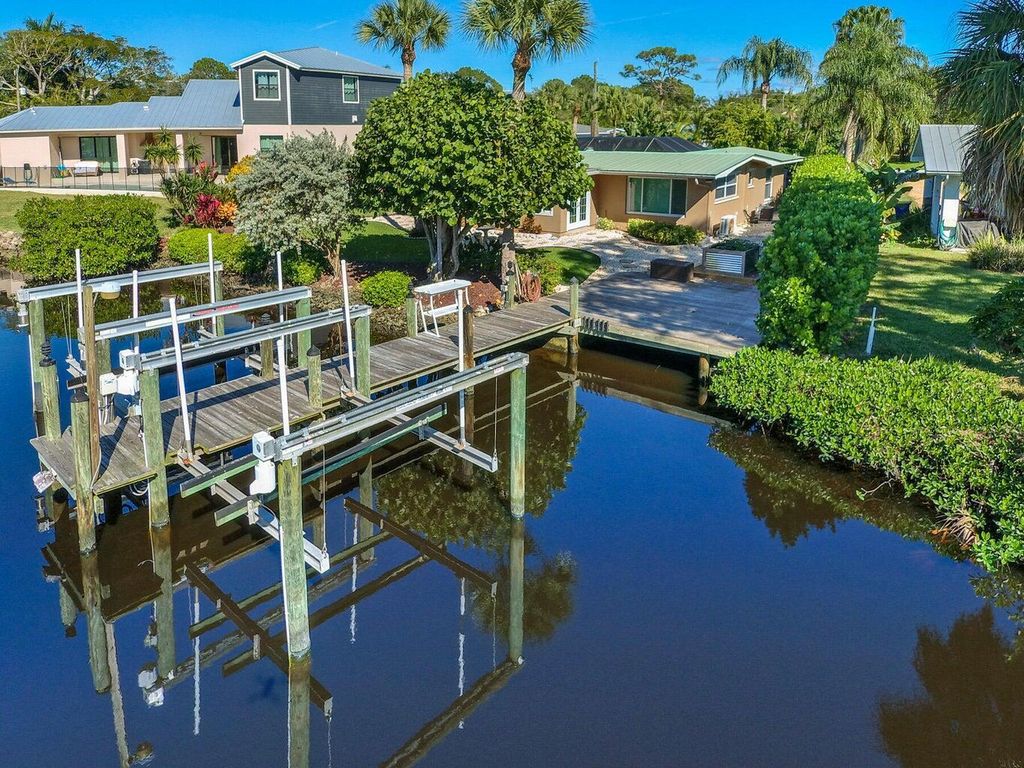 Photo of 1282 SW Pelican Crescent, Palm City, FL 34990 (MLS # B26026827)