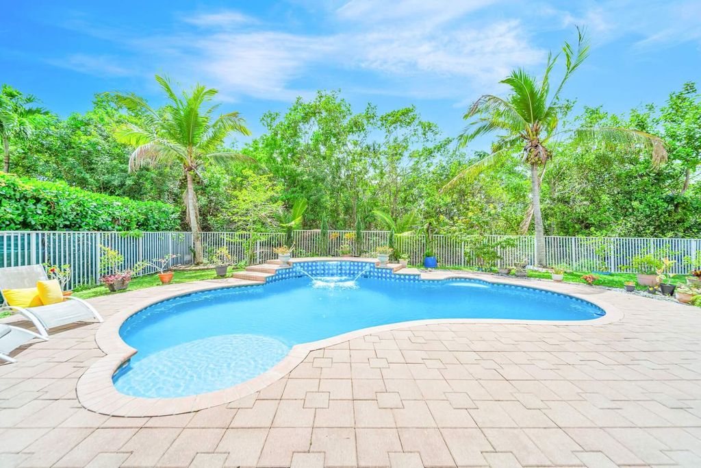 Photo of 6169 NW 53rd Circle, Coral Springs, FL 33067 (MLS # B26015473)