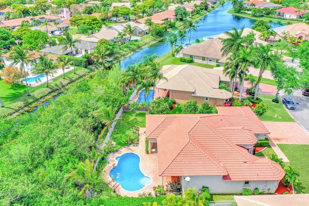 Photo of 6169 NW 53rd Circle, Coral Springs, FL 33067 (MLS # B26015473)