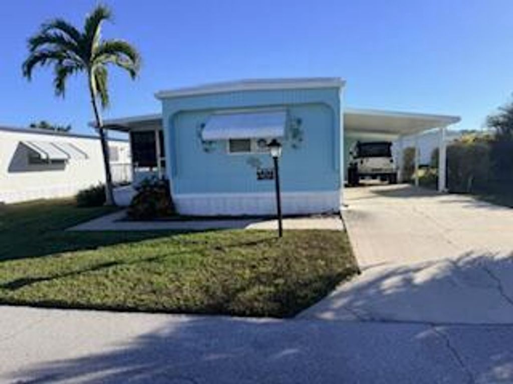 Photo of 102 N Warner Drive, Jensen Beach, FL 34957 (MLS # R10994800)