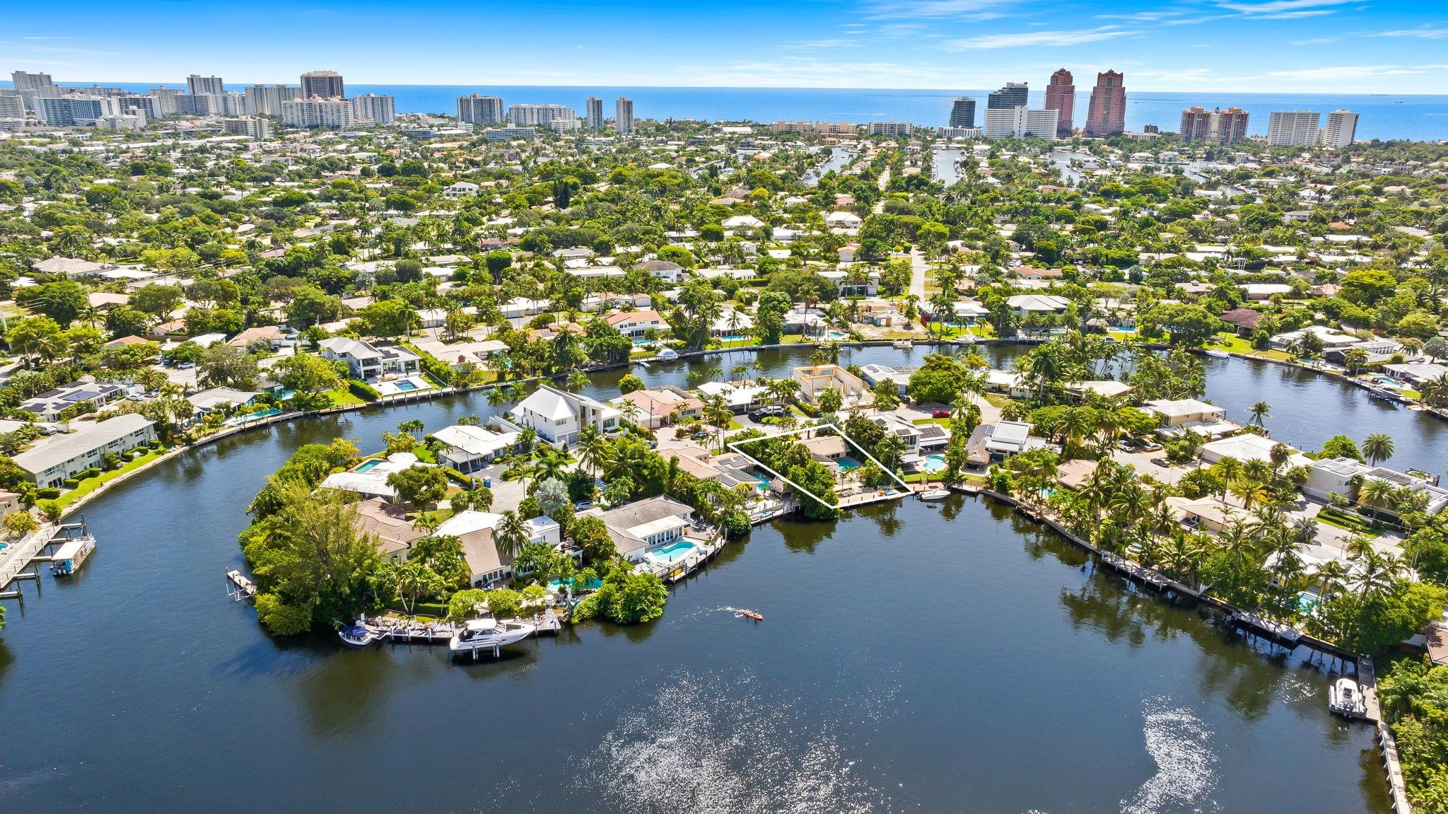 Vibrant sunsets and classic Fort Lauderdale charm with sweeping views of the Middle River. Exclusive Bal Harbour gated community, located in a private cul-de-sac on 75+ ft of waterfront with ocean access—bring your boat. Entertainer’s layout & multi-level outdoor living: gas-heated saltwater pool, deck, covered patios, 800 SF dock + 270 SF floating dock, patio mist system, outdoor shower, lush landscaping & kayaks. Inside: warm, inviting style; terrazzo floors; Scavolini kitchen w/ Bosch gas range & dishwasher; split floor plan; impact windows/doors; natural gas; tankless water heater; full-house generator; solar panels; 2-car garage, extra storage & circular driveway. Walk to Class-A retail; Whole Foods & Trader Joe’s; just minutes to Las Olas, beaches & dining. High-comfort furnishings!