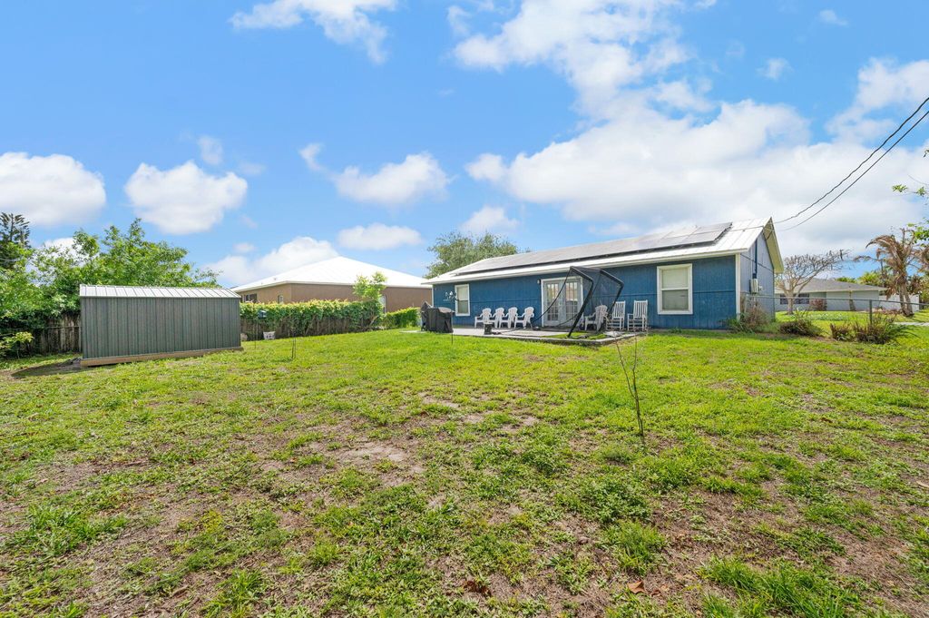 Photo of 661 NW Kildare Street, Port Saint Lucie, FL 34983 (MLS # B26014121)