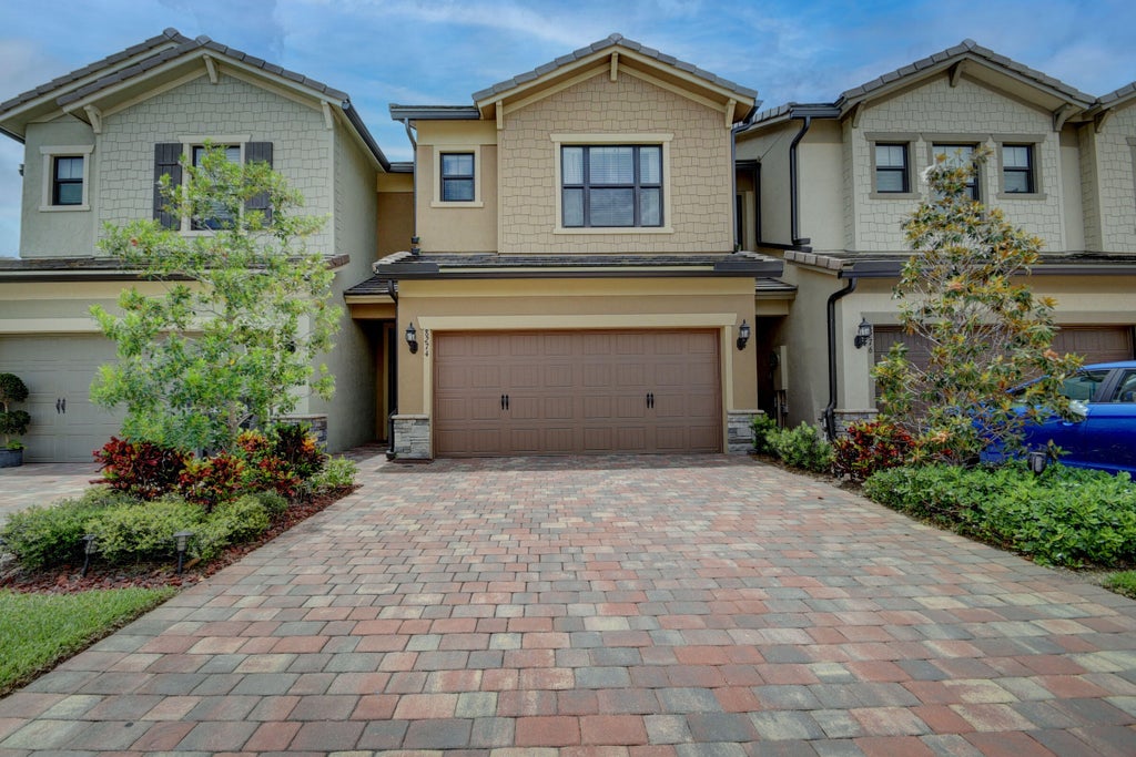 Photo of 8274 Cadre Noir Road Rd, Lake Worth Beach, FL 33467 (MLS # R10801280)