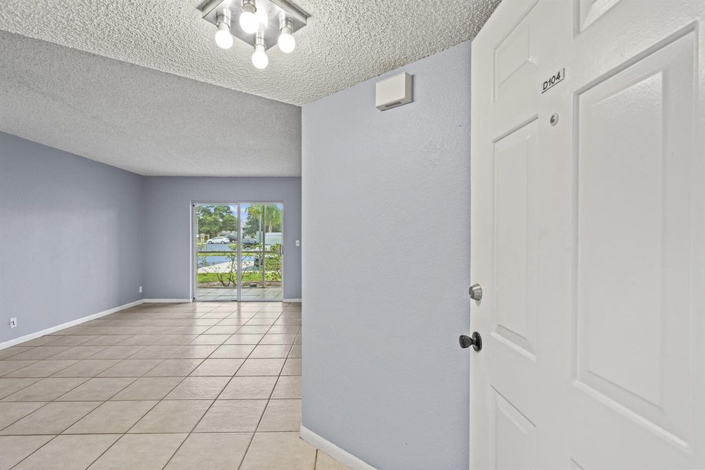 Photo of 1535 SE Royal Green Circle #104, Port Saint Lucie, FL 34952 (MLS # R11114860)