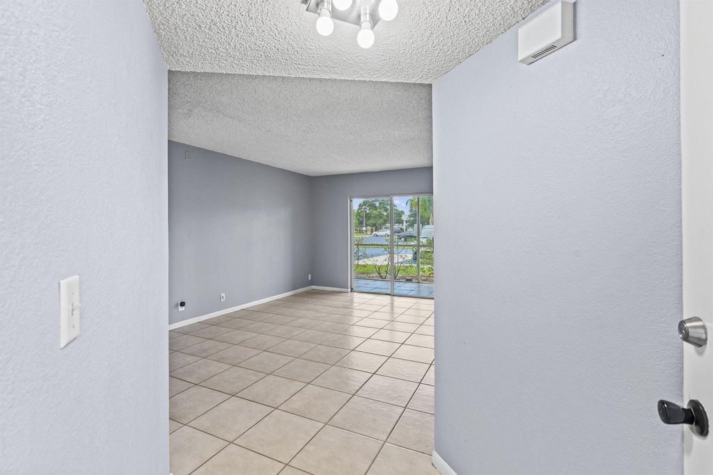 Photo of 1535 SE Royal Green Circle #104, Port Saint Lucie, FL 34952 (MLS # R11114860)