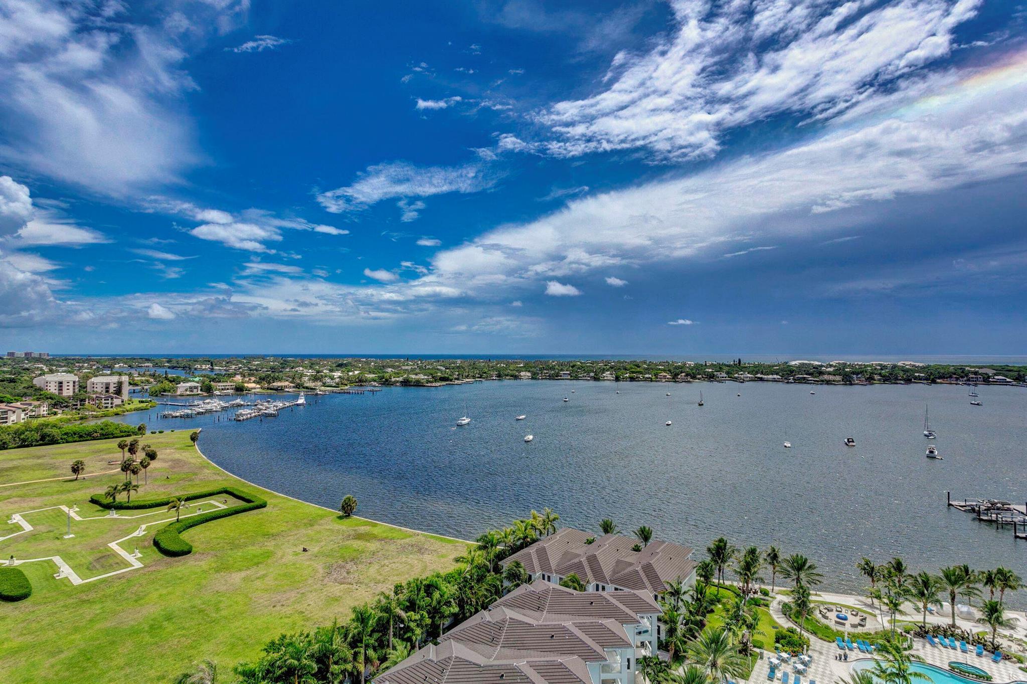 Highly Sought After ''Azure'' Model in the North Tower. This High-End Contemporary Condo boasts over 3000 total sq. ft. Spectacular Intracoastal Bay and ocean views from the large oversized covered east and west facing Terraces with room to Dine & Relax on Outdoor Furniture watching dazzling Sunrises and Sunsets. This incredible floorplan features 4 true Bedrooms since the owners turned the Den into a bedroom with a closet. All the bedrooms have a full en suite bath. 10 Foot Ceilings and Open Floorplan with Lots of Natural light from Floor to Ceiling Impact Windows & Sliding Doors around the entire spacious and totally open Kitchen, Dining, and Oversized main living areas. Exquisite details and finishes throughout this modern & newly constructed condominium.