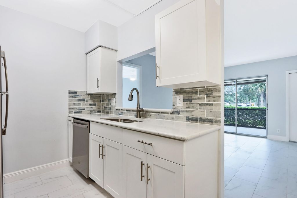 Photo of 6313 Chasewood Drive #B, Jupiter, FL 33458 (MLS # R10856296)