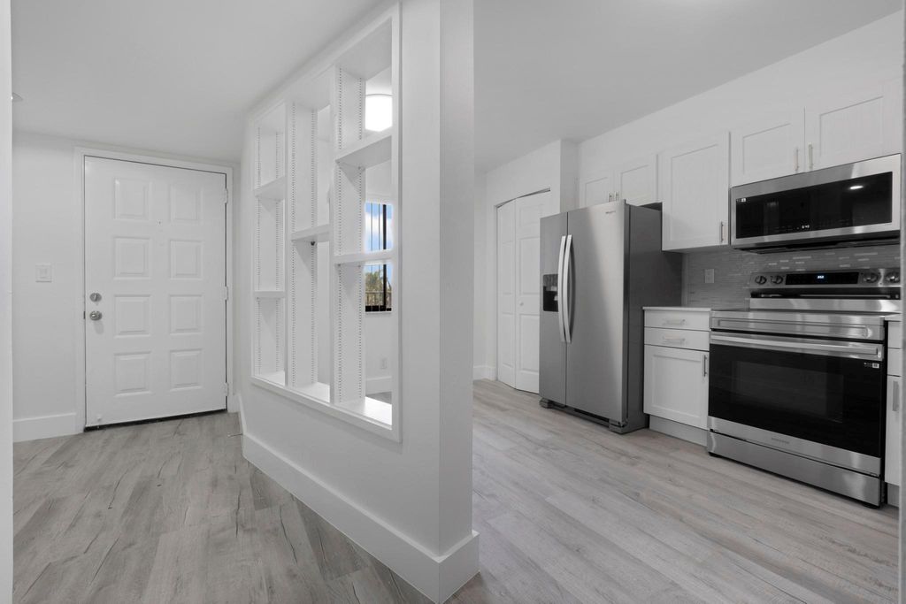 Photo of 2200 S Cypress Bend Dr #402, Pompano Beach, FL 33069 (MLS # F10538288)