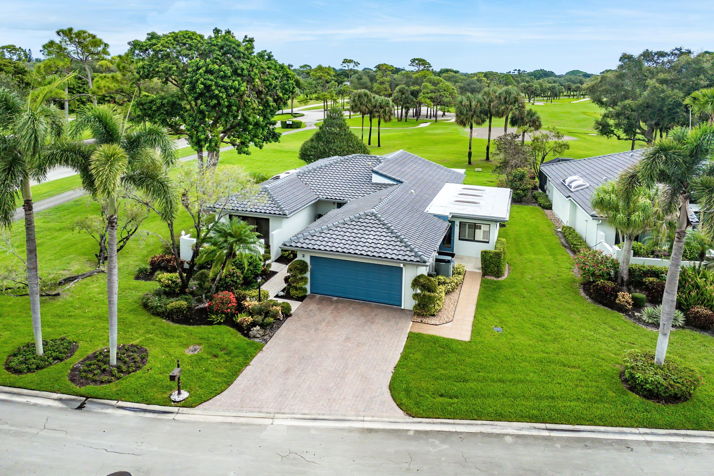 Exceptional opportunity to own an updated home in the desirable subdivision of The Woods at Hunters Run Country Club. This impeccably maintained, 2864 sq-ft residence features panoramic golf course views, two en-suite bedrooms, and a versatile den that can serve as an optional third bedroom. The updated kitchen and bathrooms offer move-in-ready convenience, and the expanded great room, with a custom wet bar, provides the perfect setting for entertaining friends and family. Complete Hurricane impact windows and doors, along with a full-house standby generator, offer peace of mind during storm season. The best of country club living is waiting for you. Make this your home at Hunters Run today!