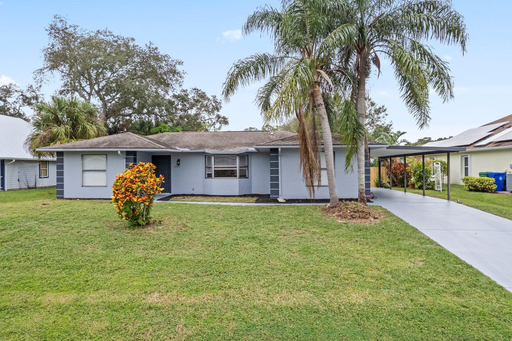 Fully renovated 3BR/2.5BA home in Sebastian with 1,824 sq ft of modern living! Features brand-new ceramic tile floors, fresh paint inside/out, and a dream kitchen with 42'' cabinets, quartz counters, and stainless steel appliances. Bathrooms are completely updated with quartz and stylish finishes. New lighting fixtures and water heater. Includes a large storage building with new roof and wood siding--perfect for a workshop or man cave. Located in a quiet, family-friendly neighborhood. Move-in ready and priced to sell fast--don't miss it!