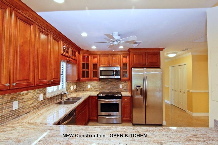 Be the first to live in this Brand New 100% completely renovated pristine villa. Located on a deep golf view with immaculate southwestern exposure truly unsurpassed in Design, Comfort & Quality. This Luxurious Unit had been reconfigured to Create New Open Floor Plan with New Office and/or 3rd Bedroom & Dedicated Laundry Room. The details and full scope of the renovation is listed along with the photos displayed. West Farms Development is proud to offer the closest to a newly constructed home or condominium in all Boca Raton at this Price Point. Buyers receive Full One Year Home Warranty with purchase and proven track record in Boca Lago. ‘‘We've done the work for you! Move-In, Worry free living.'' This is not just a cosmetic renovation, but completely reconstructed for 2015 and beyond. Adult 55, Non-Mandatory Membership Community.