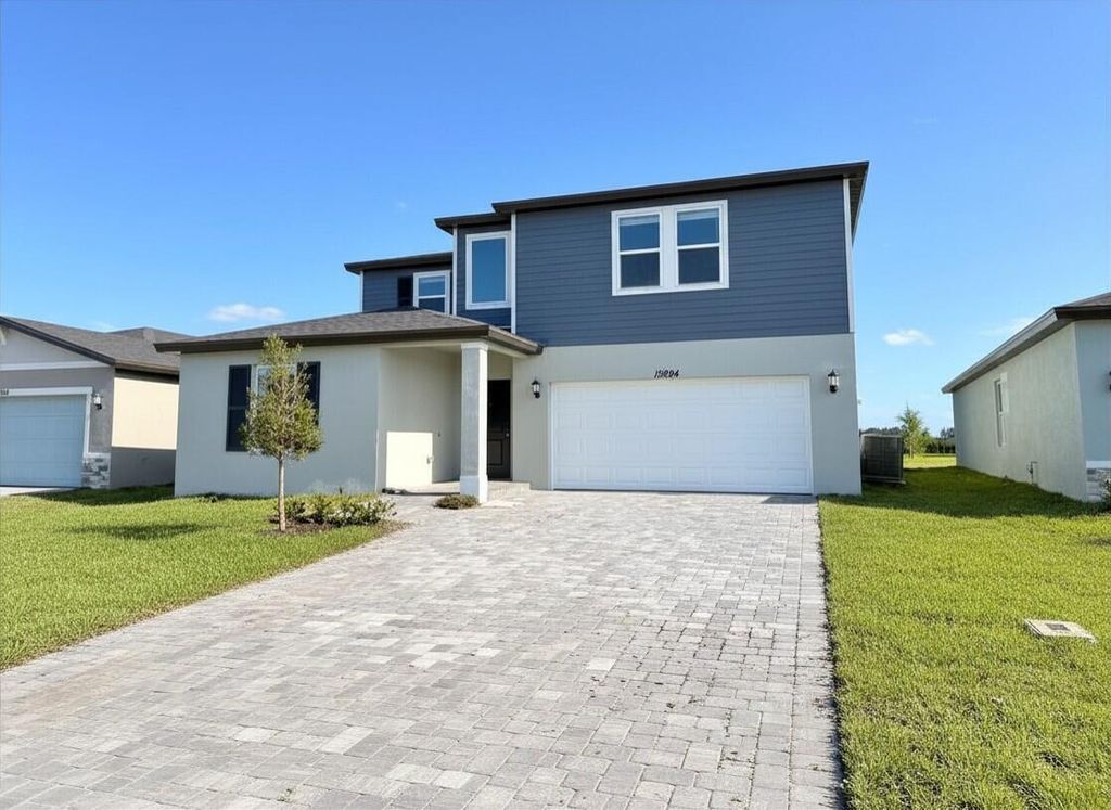 Photo of 15804 Vine Drive, Indiantown, FL 34956 (MLS # B26023003)