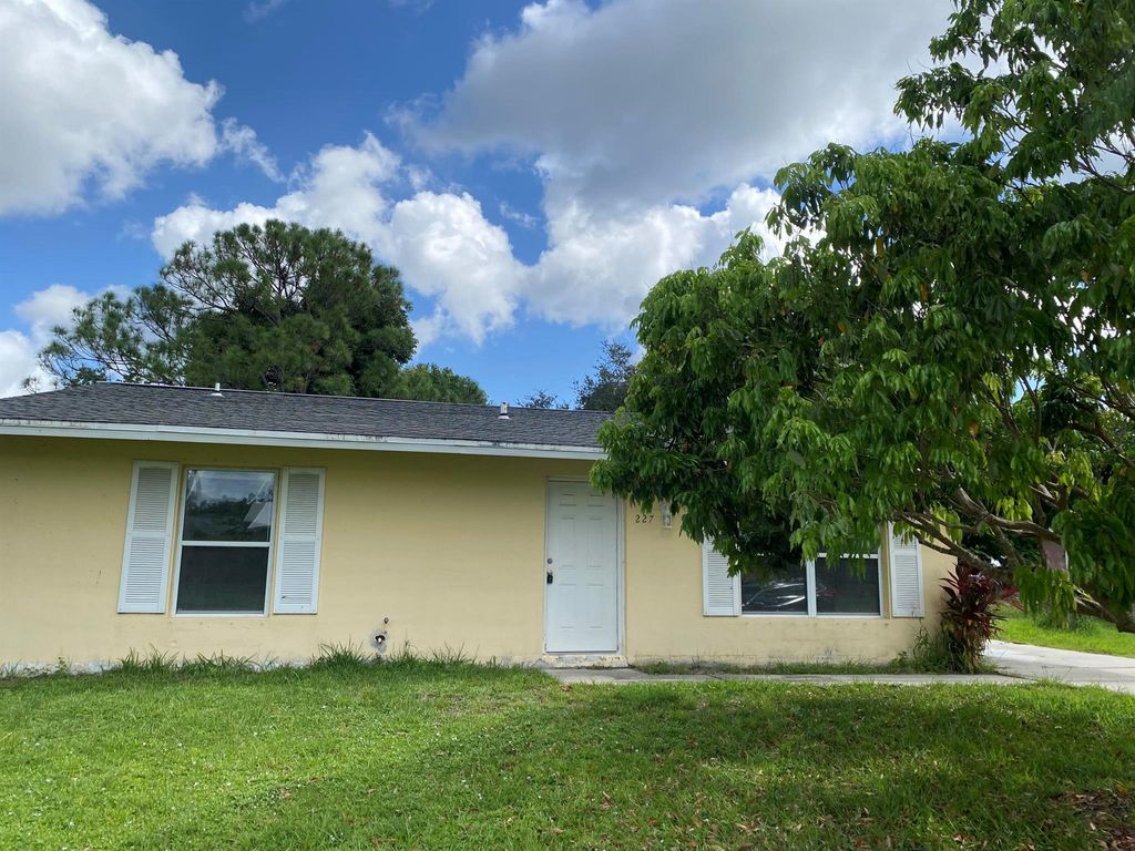Photo of 227 NE Camelot Drive, Port Saint Lucie, FL 34983 (MLS # R11118626)