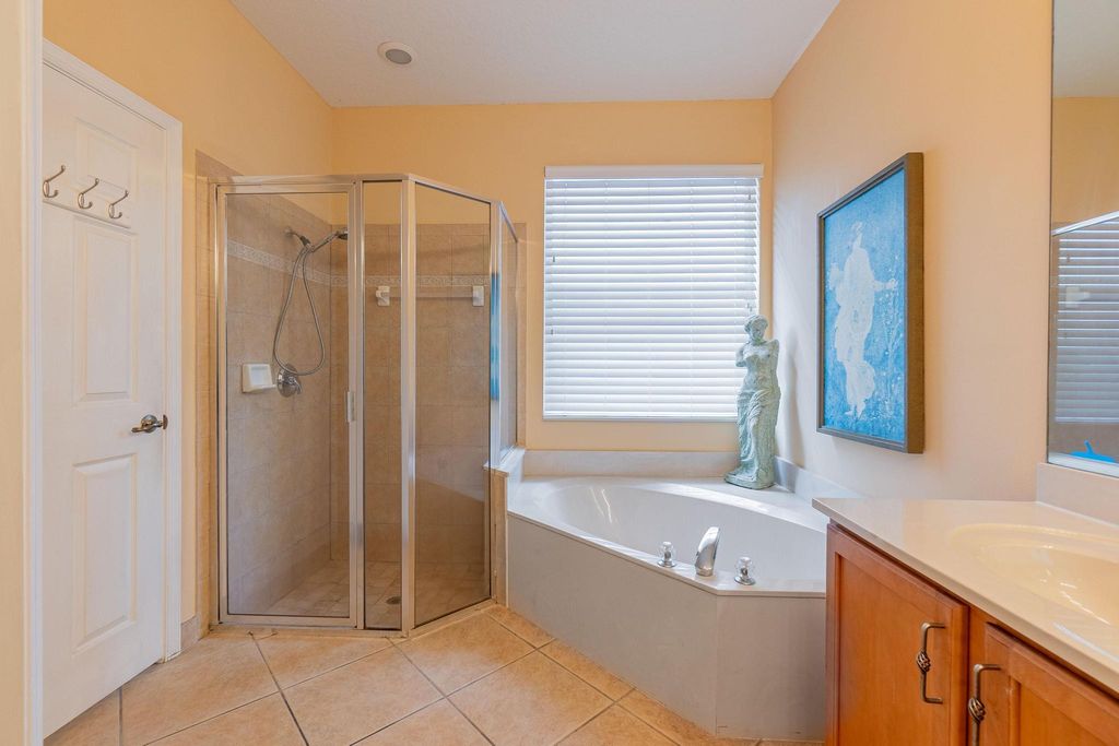 Photo of 4076 NW Deer Oak Drive, Jensen Beach, FL 34957 (MLS # R10955112)