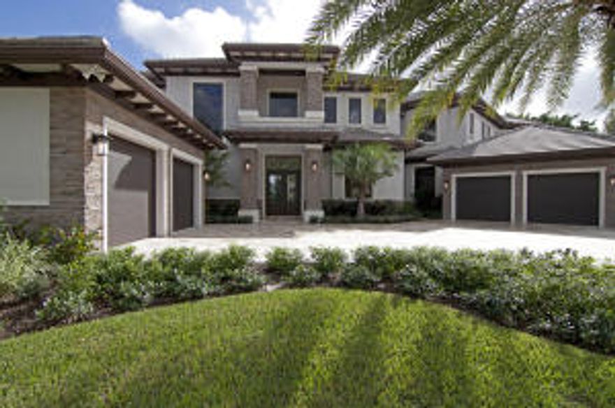 New Construction SMART Home!  Luxury built Modern Metropolitan 2 story home with panoramic expansive lake & golf views. Spacious open floor plan, architectural detail, high end finishing, clean lines, SMART technology, hardwood floors, marble, natural stone, gourmet kitchen with Wolf & Sub-Zero appliances, retractable Phantom screened covered loggia and more.  Ground floor Master, 5 additional ensuite bedrooms with golf/water views, elevator and bonus rooms.  This is the WOW house on one of St Andrews Country Club prime lots that impresses all from  every angle, inside & outside.  You'll be impressed not only by its appearance but by just how SMART it is.  You'll also be comfortable and secure living in this house in St Andrews Country Club,  the premier country club in South Florida.