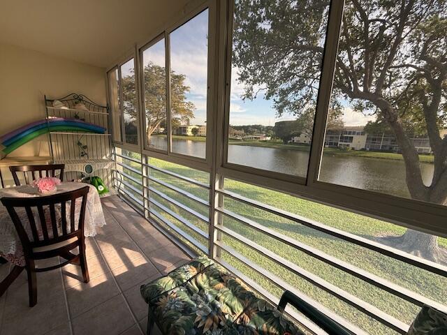 MOTIVATED $ NEGOTIABLE $ ,Beautiful Lake View, Enclosed Patio with Sliding Windows, Central air conditioning, FULLY FURNISHED, TURNKEY. WATER - CABLE- HIGHSPEED INTERNET ALL INCLUDED in HOA Fee. (Dorset I: $357..80 + Master: $274.79) Superbly clean, you will see yourself living there. Fine touches like custom blinds in the living room, pocket door that allows for a guess to have its own privacy and bathroom. Century Village is a super active adult community where there is more to do than can possibly be done. You can live comfortably without a car as the buses are frequent, on time, with very personable drivers, and you can transfer to go anywhere the city buses go to like the Beach, Town Center Mall, Costco, Walmart. Take the time to visit - you might fall in love with this cute condo