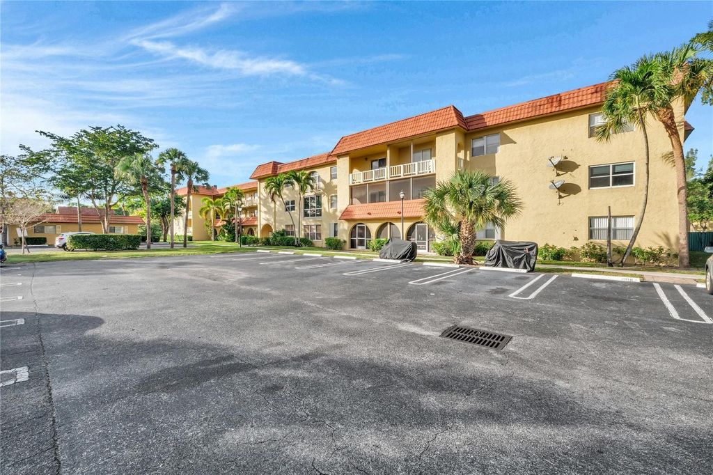 Photo of 10762 La Placida Drive #7-306, Coral Springs, FL 33065 (MLS # F10545879)