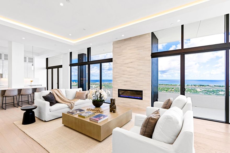 NEW UPGRADES JUST COMPLETED! This never been lived in fully renovated PENTHOUSE features beautiful blonde oak wood flooring throughout, 12-ft ceilings, an impressive open floor plan, and the most spectacular panoramic views of the ocean, Intracoastal, and Palm Beach Island. The primary suite boasts new custom dual closets and dual baths. All of the bedrooms have en-suite bathrooms. This spacious 3-Bed/4-Bath residence also has a den and separate office area. The sleek design creates a contemporary atmosphere that highlights the floor to ceiling views. The state-of-the art kitchen, equipped with two large islands, Subzero refrigerator, Thermador double ovens, and wine fridge is perfect for entertaining. Impact glass throughout. Elevator opens to a stunning private foyer with... ...marble floors. The Plaza offers amazing amenities and first-class staff including 24-hour valet, concierge, security, impressive fitness center, sauna, tennis/pickleball courts, and two swimming pools. Conveniently located 2 minutes from Palm Beach Island. Amazing coveted location on Flagler Drive!