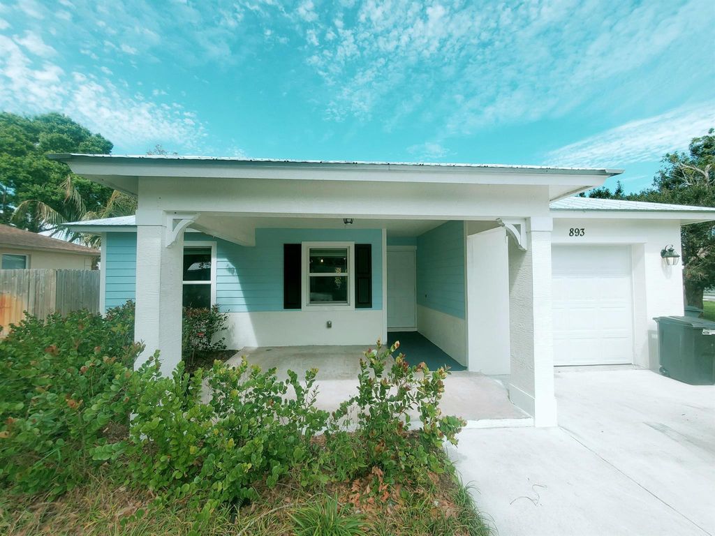 Photo of 893 NW 12th Terrace, Stuart, FL 34994 (MLS # R10965237)