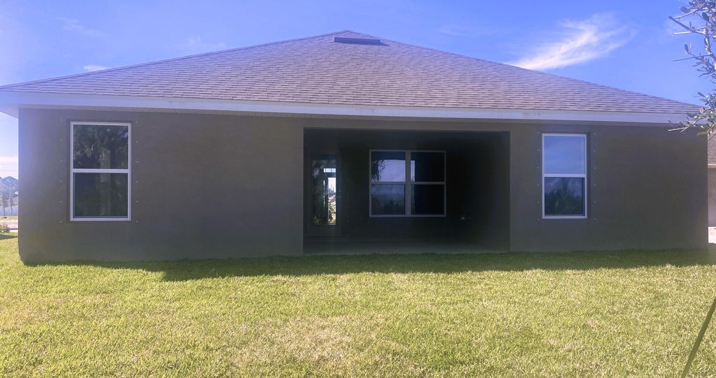 Photo of 8668 Pavia Street, Fort Pierce, FL 34951 (MLS # R10969042)