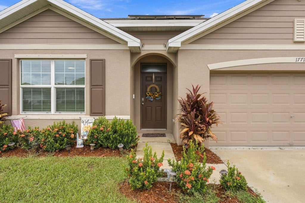 Photo of 1771 SW LOFGREN Avenue, Port Saint Lucie, FL 34953 (MLS # B26084652)