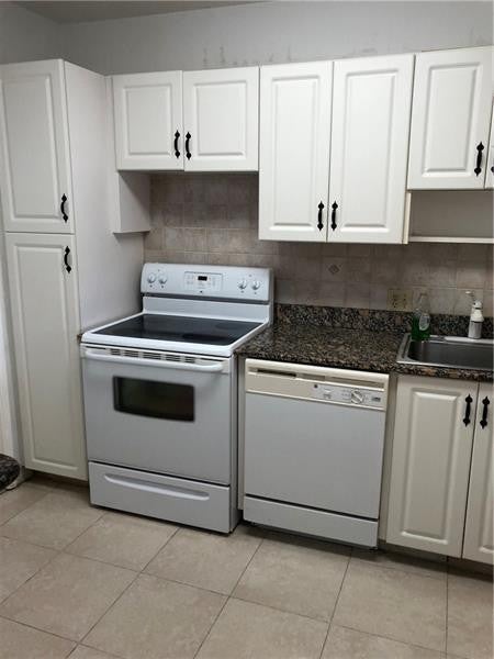 Photo of 3150 N Palm Aire Drive #Unit 407, Pompano Beach, FL 33069 (MLS # B26078677)