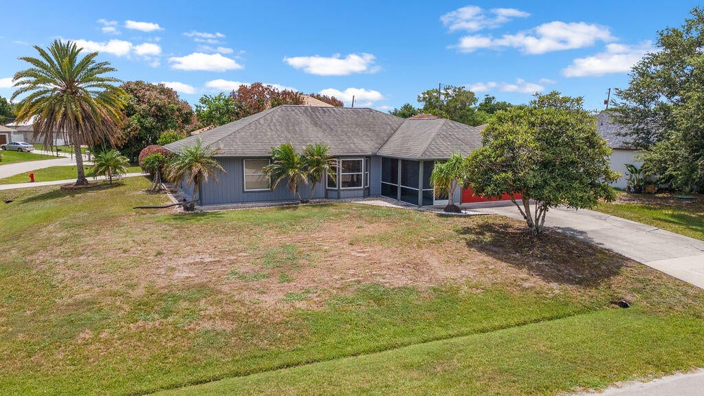 Photo of 403 SW Cahoon Court, Port Saint Lucie, FL 34953 (MLS # B26038930)
