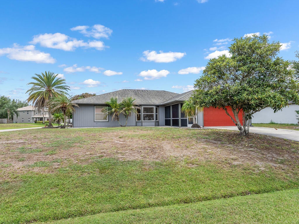 Photo of 403 SW Cahoon Court, Port Saint Lucie, FL 34953 (MLS # B26038930)
