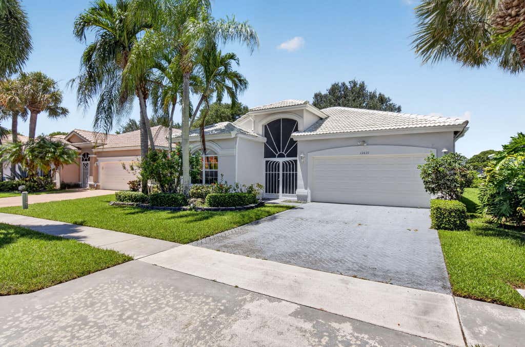 Photo of 12631 CORAL LAKES Drive, Boynton Beach, FL 33437 (MLS # B26065901)
