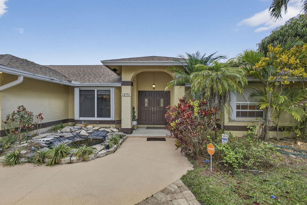 Photo of 12751 Orange Blvd, West Palm Beach, FL 33412 (MLS # B26000716)