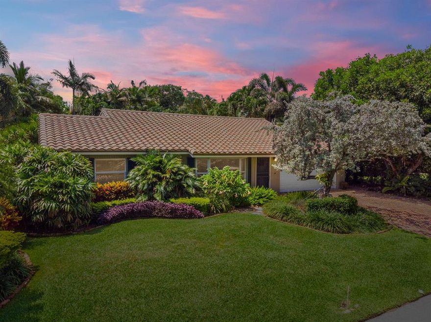 THE PERFECT HOME FOR THE BEACH LOVER AND THE GARDENER.  THIS CHARMING HOME FEATURES EVERYTHING YOU NEED FOR THE South Florida LIFESTYLE INCLUDED DEEDED BEACH ACCESS A SHORT WALK AWAY.