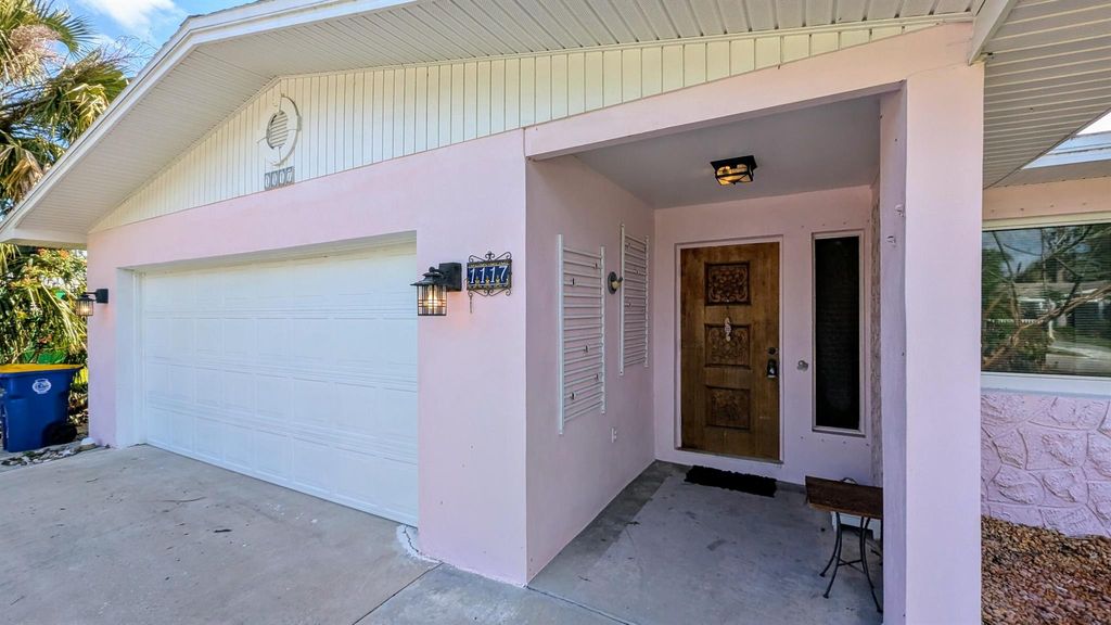 Photo of 1117 NE Kubin Avenue, Jensen Beach, FL 34957 (MLS # R11078693)