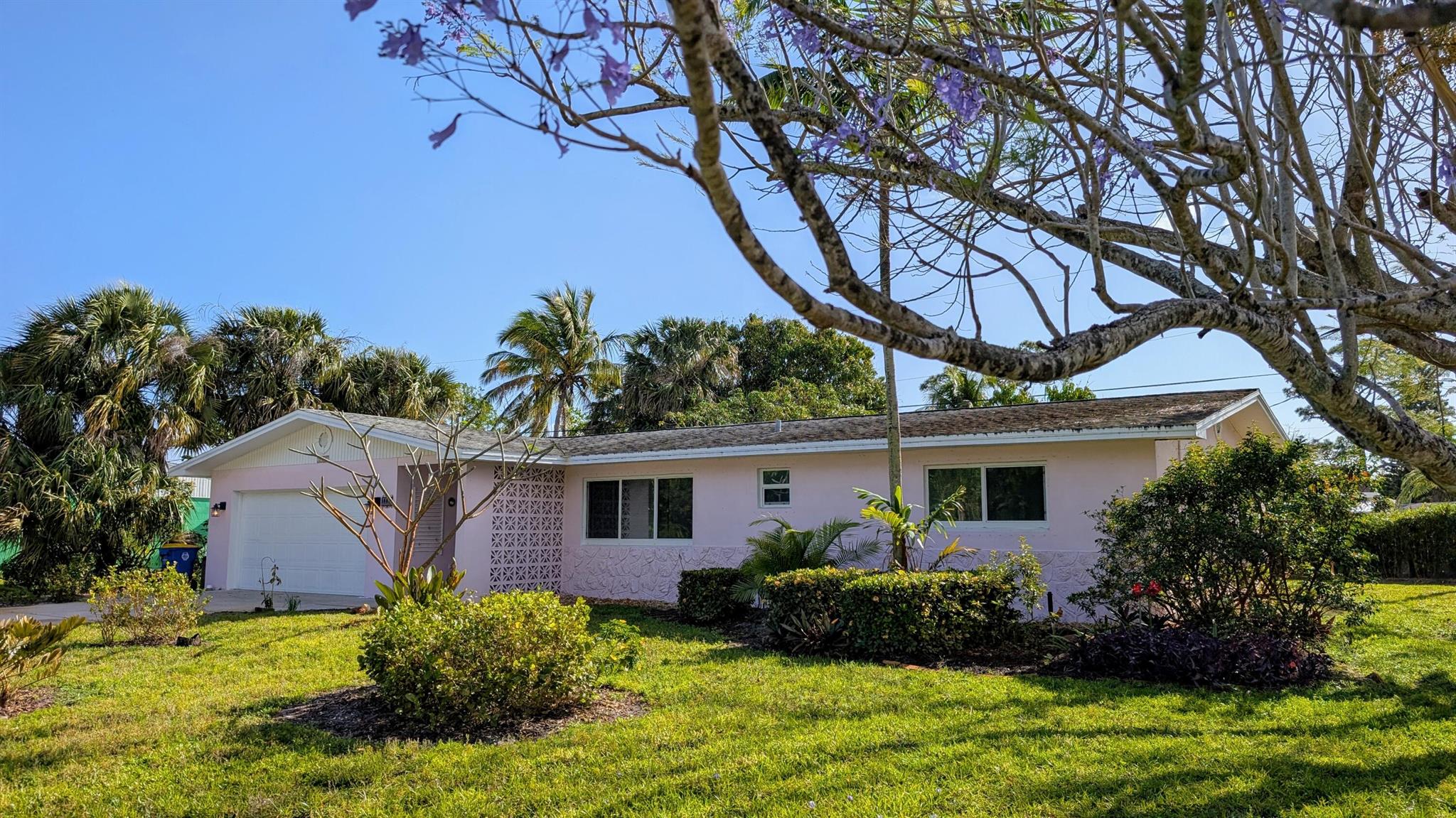 Classic Mid-Century Charmer! Desirable Jensen Beach/Rio Location with this ''Partial furnished or Unfurnished'' Solid Concrete Block 2 Bedroom,2 Bathroom + Florida Room ++ 2 Car Garage Home!! The Spacious interior offers a large kitchen with pass-through to the Private Lanai, a separate ''Flex'' room with a Full-Size Washer & Dryer Plus a comfortable living, dining and family area. NO HOA! Truck/Trailer Friendly and small pet welcome too! (case by case). The Home is on County Water and County Sewer with Lawncare fully included. Newer Energy Efficient Impact Windows. Convenient to the Intracoastal Waterway, Historic Downtown Stuart, Jensen Beach plus Hutchinson Island Beaches.