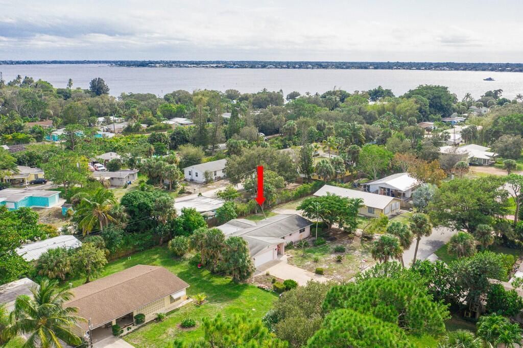 Photo of 1117 NE Kubin Avenue, Jensen Beach, FL 34957 (MLS # R11078693)