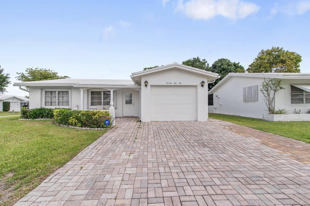 Photo of 7110 NW 73rd Avenue, Tamarac, FL 33321 (MLS # R11146439)