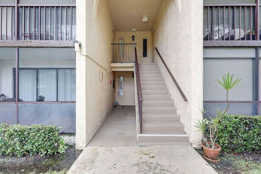 Beautiful 2-bedroom 2-bathroom condo. Active adult 55 and over community. Enjoy resort-style living with access to scenic walking trails, a heated pool and hot tub, clubhouse, tennis/pickleball and bocce courts, and more. This light-filled unit features tile flooring throughout, a spacious eat-in kitchen with newer stainless steel appliances, and a primary  bedroom complete with a walk-in closet. The secondary bedroom offers dual closets, ideal for guests or extra storage. A generous utility room includes a full-size washer and dryer for your convenience.Reasonable HOA dues include building insurance, roof maintenance, building maintenance, water, trash service & basic cable.
