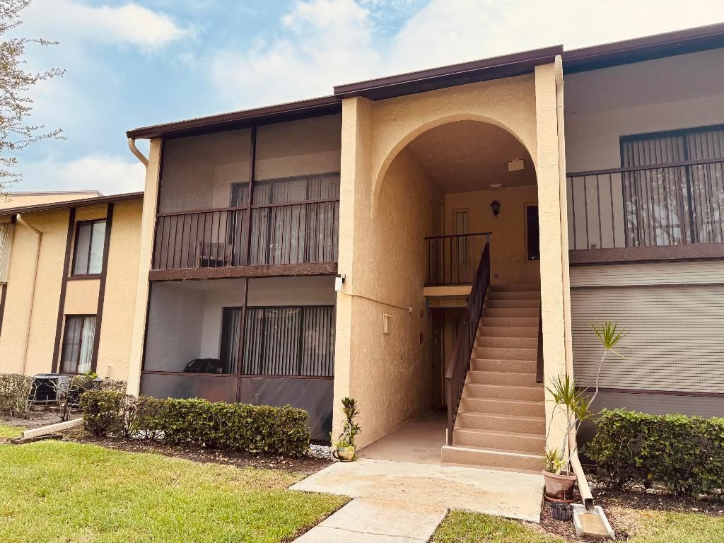 Photo of 802 Sky Pine Way #F2, Greenacres, FL 33415 (MLS # R11127677)