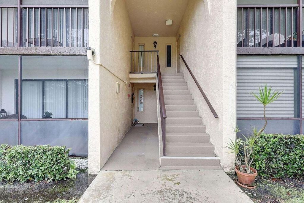 Photo of 802 Sky Pine Way #F2, Greenacres, FL 33415 (MLS # R11127677)