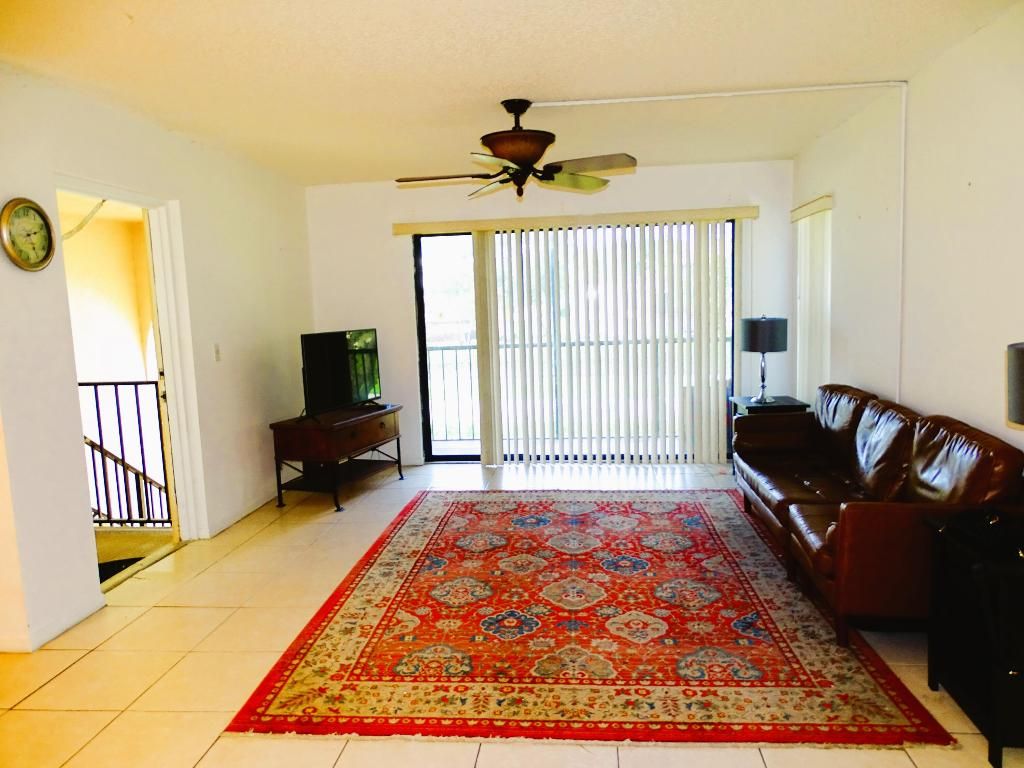 Photo of 802 Sky Pine Way #F2, Greenacres, FL 33415 (MLS # R11127677)