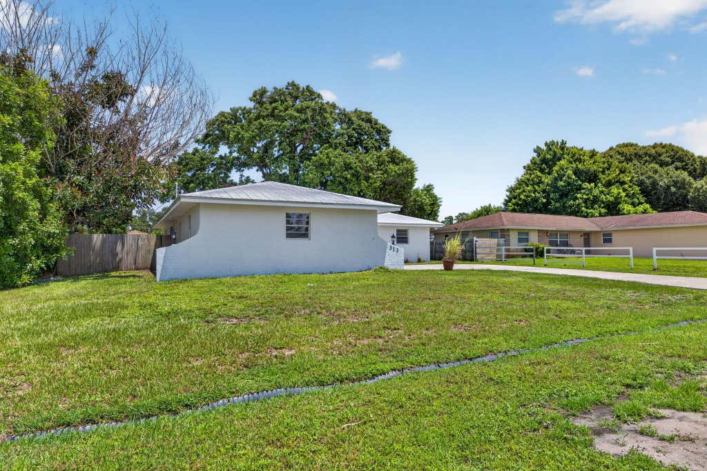 Photo of 313 SE Atlas Terrace, Port Saint Lucie, FL 34983 (MLS # B26058573)